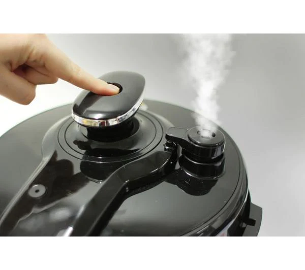 Small image of a hand pressing on the button